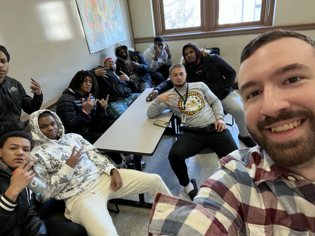 Paul and his students in a classroom at Lackawanna College.