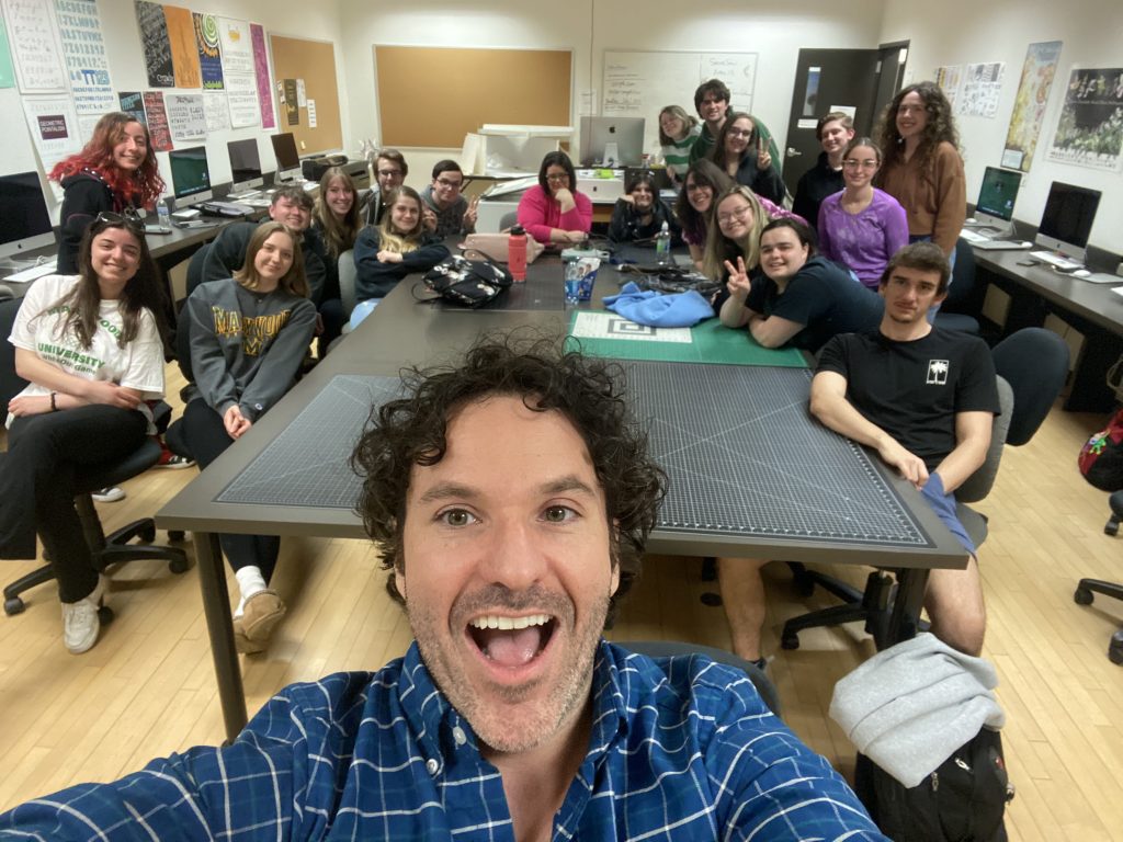 Joey teaching his students in a Marywood university computer lab. 