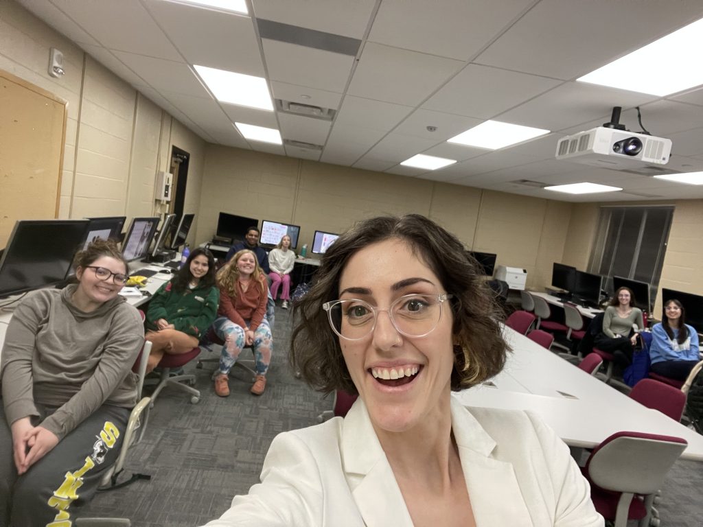 Kat and her students in a Scranton University classroom.